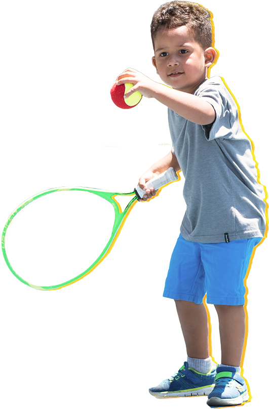 Boy hitting red ball 